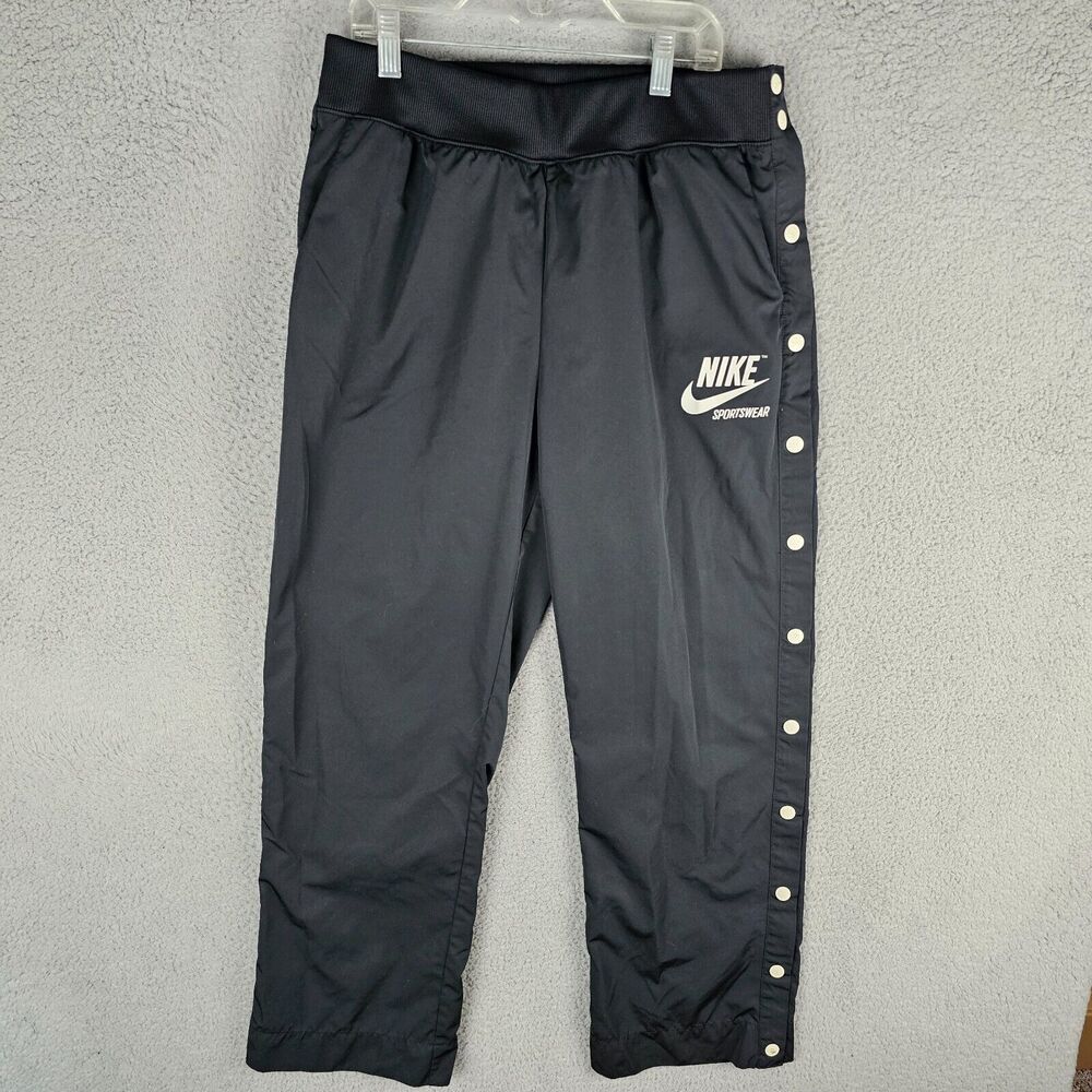Nike Sportswear Black Track Pants with White Snap Buttons – Size Medium